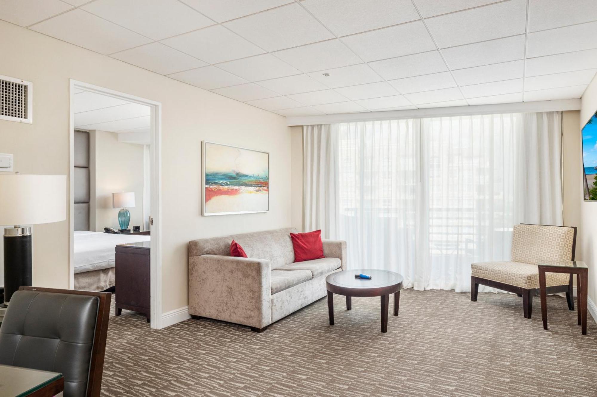 Queen Suite with Balcony and Pool View