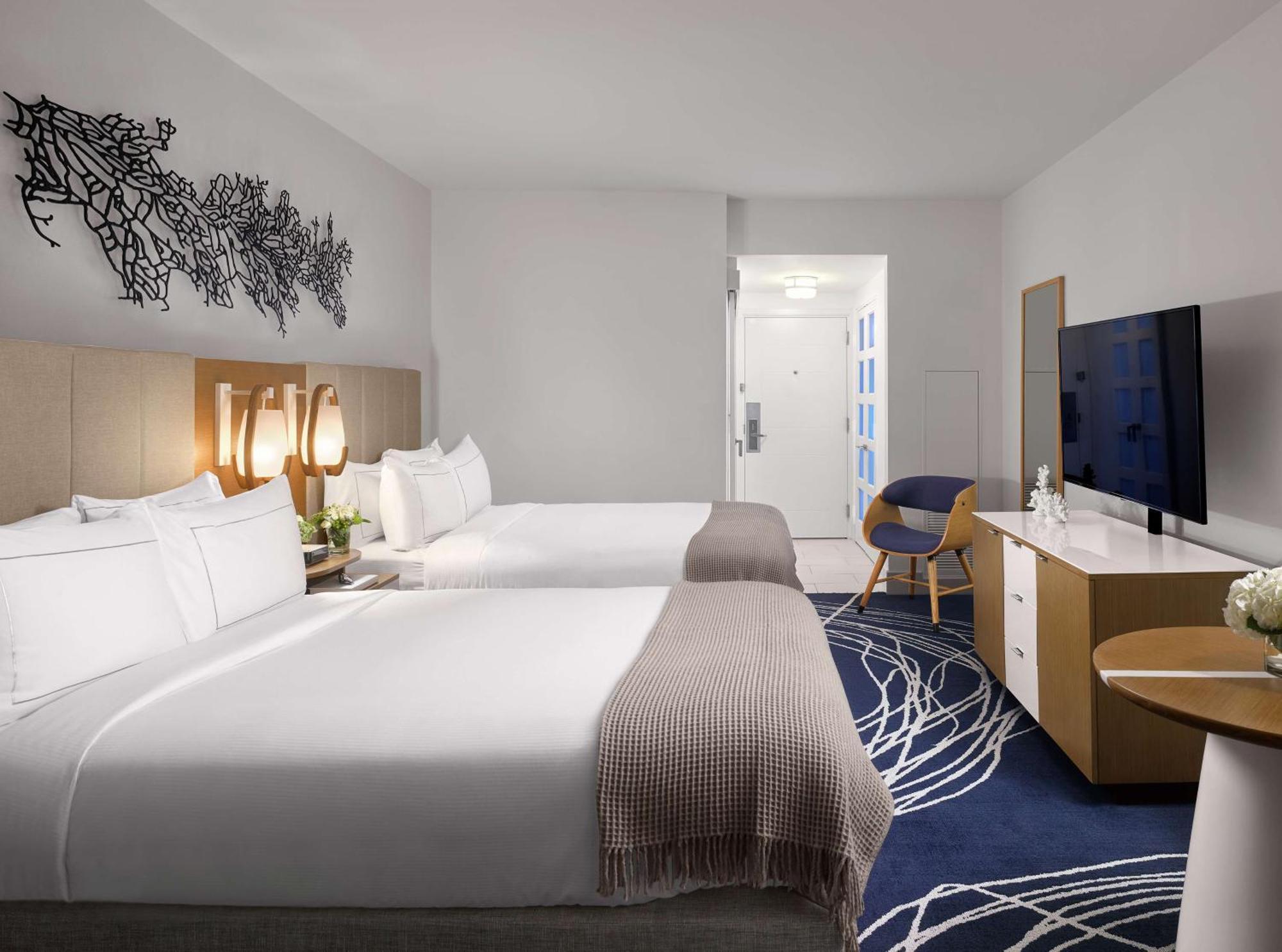 Double Room with Two Double Beds, Balcony and Water View - Exterior Corridor,1552443511:JPEG